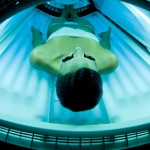 Woman in tanning bed