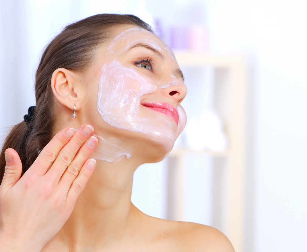 Beautiful Woman Applying Natural Homemade Facial Mask